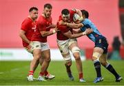 19 April 2025; Tom Ahern of Munster is tackled by Johan Goosen of Vodacom Bulls during the United Rugby Championship match between Munster and Vodacom Bulls at Thomond Park in Limerick. Photo by David Fitzgerald/Sportsfile