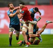 19 April 2025; Tom Ahern of Munster is tackled by Jannes Kirsten, left, and Sebastien de Klerk of Vodacom Bulls during the United Rugby Championship match between Munster and Vodacom Bulls at Thomond Park in Limerick. Photo by David Fitzgerald/Sportsfile