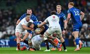 19 April 2025; Scott Penny of Leinster is tackled by Rob Herring, left, and David McCann of Ulster during the United Rugby Championship match between Leinster and Ulster at the Aviva Stadium in Dublin. Photo by Brendan Moran/Sportsfile