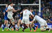 19 April 2025; Joe McCarthy of Leinster is tackled by Ulster players Andrew Warwick, left, and Alan O’Connor during the United Rugby Championship match between Leinster and Ulster at the Aviva Stadium in Dublin. Photo by Brendan Moran/Sportsfile