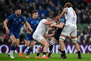 19 April 2025; Alex Soroka of Leinster is tackled by Ulster players Rob Herring, left, and Cormac Izuchukwu during the United Rugby Championship match between Leinster and Ulster at the Aviva Stadium in Dublin. Photo by Sam Barnes/Sportsfile