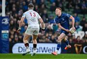 19 April 2025; Ciarán Frawley of Leinster in action against Jude Postlethwaite of Ulster during the United Rugby Championship match between Leinster and Ulster at the Aviva Stadium in Dublin. Photo by Sam Barnes/Sportsfile