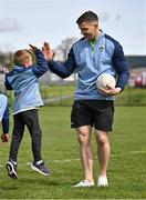 22 April 2025; Galway Footballer and Kellogg’s GAA Cúl Camps ambassador Damien Comer with Lev Dedenko at Kellogg’s Cúl and Curious camp in St Breckan’s GAA in Lisdoonvarna. The Cúl and Curious camp saw children from migrant families invited to take part in a unique introductory Kellogg’s GAA Cúl Camps experience, sharing the fun with local Irish children and fostering a strong sense of community spirit. Kellogg's worked closely with the GAA and Clare Sports Partnership to create the bespoke Kellogg’s GAA Cúl Camp which saw 100 children take part. Photo by Sam Barnes/Sportsfile