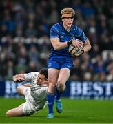 19 April 2025; Tommy O’Brien of Leinster evades the tackle of Jacob Stockdale of Ulster on his way to scoring his side's first try during the United Rugby Championship match between Leinster and Ulster at the Aviva Stadium in Dublin. Photo by Sam Barnes/Sportsfile