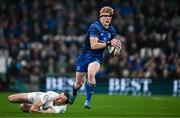 19 April 2025; Tommy O’Brien of Leinster evades the tackle of Jacob Stockdale of Ulster on his way to scoring his side's first try during the United Rugby Championship match between Leinster and Ulster at the Aviva Stadium in Dublin. Photo by Sam Barnes/Sportsfile