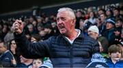 19 April 2025; A Dublin supporter cheers a late score during the Leinster GAA Hurling Senior Championship Round 1 match between Dublin and Offaly at Parnell Park in Dublin. Photo by Ray McManus/Sportsfile