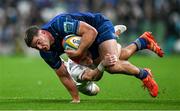 19 April 2025; Scott Penny of Leinster is tackled by Michael Lowry of Ulster during the United Rugby Championship match between Leinster and Ulster at the Aviva Stadium in Dublin. Photo by Brendan Moran/Sportsfile