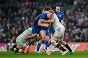 19 April 2025; Ciarán Frawley of Leinster is tackled by Ulster players Tom O’Toole, left, and David McCann during the United Rugby Championship match between Leinster and Ulster at the Aviva Stadium in Dublin. Photo by Sam Barnes/Sportsfile