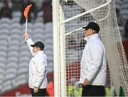 19 April 2025; Umpire Colm Smith raises the orange flag after Brian Hurley of Cork scored a two-pointer from a free during the Munster GAA Football Senior Championship semi-final match between Cork and Kerry at Supervalu Páirc Uí Chaoimh in Cork. Photo by Piaras Ó Mídheach/Sportsfile
