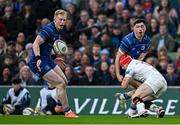 19 April 2025; Jimmy O'Brien of Leinster attempts to offload to team-mate Jimmy O'Brien as he is tackled by Michael Lowry of Ulster during the United Rugby Championship match between Leinster and Ulster at the Aviva Stadium in Dublin. Photo by Sam Barnes/Sportsfile