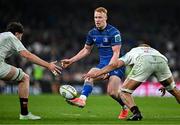 19 April 2025; Ciarán Frawley of Leinster in action against Ulster players David McCann, left, and Cormac Izuchukwu during the United Rugby Championship match between Leinster and Ulster at the Aviva Stadium in Dublin. Photo by Sam Barnes/Sportsfile