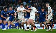 19 April 2025; Diarmuid Mangan of Leinster is tackled by Ulster players David McCann, left, and Tom O’Toole during the United Rugby Championship match between Leinster and Ulster at the Aviva Stadium in Dublin. Photo by Brendan Moran/Sportsfile