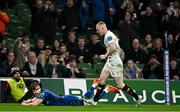 19 April 2025; Garry Ringrose of Leinster scores his side's fourth try despite the attention of Nathan Doak of Ulster during the United Rugby Championship match between Leinster and Ulster at the Aviva Stadium in Dublin. Photo by Sam Barnes/Sportsfile