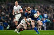 19 April 2025; Tommy O'Brien of Leinster is tackled by Nathan Doak of Ulster during the United Rugby Championship match between Leinster and Ulster at the Aviva Stadium in Dublin. Photo by Sam Barnes/Sportsfile