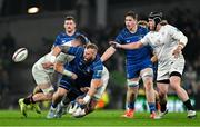 19 April 2025; RG Snyman of Leinster is tackled by Ulster players Nick Timoney, left, and Kieran Treadwell during the United Rugby Championship match between Leinster and Ulster at the Aviva Stadium in Dublin. Photo by Brendan Moran/Sportsfile