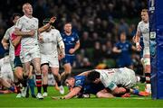 19 April 2025; Dan Sheehan of Leinster scores his side's sixth try despite the efforts of Tom Stewart of Ulster during the United Rugby Championship match between Leinster and Ulster at the Aviva Stadium in Dublin. Photo by Sam Barnes/Sportsfile