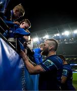 19 April 2025; RG Snyman of Leinster signs autographs for supporters after his side's victory in the United Rugby Championship match between Leinster and Ulster at the Aviva Stadium in Dublin. Photo by Brendan Moran/Sportsfile