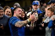 19 April 2025; Andrew Porter of Leinster takes selfies with supporters after the United Rugby Championship match between Leinster and Ulster at the Aviva Stadium in Dublin. Photo by Brendan Moran/Sportsfile
