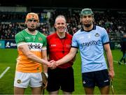 19 April 2025; Referee Johnny Murphy with the two captains, Ciaran Burke of Offaly and Chris Crummey of Dublin, before the Leinster GAA Hurling Senior Championship Round 1 match between Dublin and Offaly at Parnell Park in Dublin. Photo by Ray McManus/Sportsfile