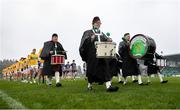 19 April 2025; The Kiltubrid Pipe Band leads both teams onto the pitch before the Connacht GAA Football Senior Championship semi-final match between Leitrim and Mayo at Avant Money Páirc Seán Mac Diarmada in Carrick-on-Shannon, Leitrim. Photo by Thomas Flinkow/Sportsfile