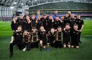 19 April 2025; The Westmanstown RFC mini team with Leinster players Rob Russell and Rónan Kelleher before the United Rugby Championship match between Leinster and Ulster at the Aviva Stadium in Dublin. Photo by Brendan Moran/Sportsfile