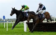 20 April 2025; Sticwiththeprocess, with Mark Walsh up, left, leads eventual winner Grann's Boy, with Darragh O'Keeffe up, over the last on their way to winning The Cawley Furniture Novice Handicap Hurdle on day two of the Fairyhouse Easter Festival at Fairyhouse Racecourse in Ratoath, Meath. Photo by Shauna Clinton/Sportsfile