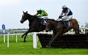 20 April 2025; Sticwiththeprocess, with Mark Walsh up, left, leads eventual winner Grann's Boy, with Darragh O'Keeffe up, over the last on their way to winning The Cawley Furniture Novice Handicap Hurdle on day two of the Fairyhouse Easter Festival at Fairyhouse Racecourse in Ratoath, Meath. Photo by Shauna Clinton/Sportsfile