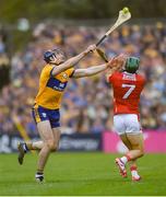 20 April 2025; David Fitzgerald of Clare in action against Mark Coleman of Cork during the Munster GAA Hurling Senior Championship Round 1 match between Clare and Cork at Zimmer Biomet Páirc Chíosóg in Ennis, Clare. Photo by John Sheridan/Sportsfile