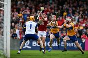 20 April 2025; Brian Hayes of Cork scores his side's first goal past Clare goalkeeper Eibhear Quilligan and Clare players Conor Leen and Darragh Lohan during the Munster GAA Hurling Senior Championship Round 1 match between Clare and Cork at Zimmer Biomet Páirc Chíosóg in Ennis, Clare. Photo by Brendan Moran/Sportsfile