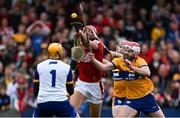 20 April 2025; Brian Hayes of Cork scores his side's first goal past Clare goalkeeper Eibhear Quilligan and Clare players Conor Leen and Darragh Lohan during the Munster GAA Hurling Senior Championship Round 1 match between Clare and Cork at Zimmer Biomet Páirc Chíosóg in Ennis, Clare. Photo by Brendan Moran/Sportsfile