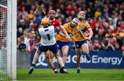 20 April 2025; Brian Hayes of Cork scores his side's first goal past Clare goalkeeper Eibhear Quilligan and Clare players Conor Leen and Darragh Lohan during the Munster GAA Hurling Senior Championship Round 1 match between Clare and Cork at Zimmer Biomet Páirc Chíosóg in Ennis, Clare. Photo by Brendan Moran/Sportsfile