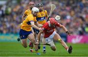 20 April 2025; Aidan McCarthy of Clare in action against Ciaran Joyce of Cork during the Munster GAA Hurling Senior Championship Round 1 match between Clare and Cork at Zimmer Biomet Páirc Chíosóg in Ennis, Clare. Photo by John Sheridan/Sportsfile