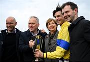 20 April 2025; Jockey Danny Mullins, second from right, with owners Fearghal and Bronagh Eastwood, centre, and winning connections after winning The WillowWarm Gold Cup (Grade 1) on Spindleberry during day two of the Fairyhouse Easter Festival at Fairyhouse Racecourse in Ratoath, Meath. Photo by Shauna Clinton/Sportsfile