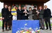 20 April 2025; Jockey Danny Mullins and trainer Willie Mullins with owners Fearghal and Bronagh Eastwood, centre, and winning connections after winning The WillowWarm Gold Cup (Grade 1) on Spindleberry during day two of the Fairyhouse Easter Festival at Fairyhouse Racecourse in Ratoath, Meath. Photo by Shauna Clinton/Sportsfile
