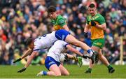 20 April 2025; Ryan O'Toole, bottom, collides with Monaghan teammate Ryan Wylie during the Ulster GAA Football Senior Championship quarter-final match between Monaghan and Donegal at St Tiernach's Park in Clones, Monaghan. Photo by Ramsey Cardy/Sportsfile