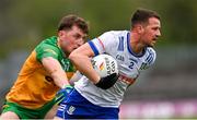 20 April 2025; Ryan Wylie of Monaghan in action against Shane O'Donnell of Donegal during the Ulster GAA Football Senior Championship quarter-final match between Monaghan and Donegal at St Tiernach's Park in Clones, Monaghan. Photo by Ramsey Cardy/Sportsfile
