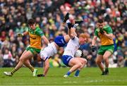 20 April 2025; Ryan O'Toole, bottom, collides with Monaghan teammate Ryan Wylie during the Ulster GAA Football Senior Championship quarter-final match between Monaghan and Donegal at St Tiernach's Park in Clones, Monaghan. Photo by Ramsey Cardy/Sportsfile