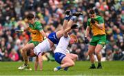 20 April 2025; Ryan O'Toole, bottom, collides with Monaghan teammate Ryan Wylie during the Ulster GAA Football Senior Championship quarter-final match between Monaghan and Donegal at St Tiernach's Park in Clones, Monaghan. Photo by Ramsey Cardy/Sportsfile