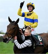 20 April 2025; Jockey Danny Mullins celebrates on Spindleberry alongside groom Hannah Utley after winning The WillowWarm Gold Cup (Grade 1) on day two of the Fairyhouse Easter Festival at Fairyhouse Racecourse in Ratoath, Meath. Photo by Shauna Clinton/Sportsfile