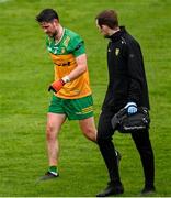 20 April 2025; Ryan McHugh of Donegal leaves the pitch after sustaining an injury during the Ulster GAA Football Senior Championship quarter-final match between Monaghan and Donegal at St Tiernach's Park in Clones, Monaghan. Photo by Ramsey Cardy/Sportsfile