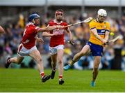 20 April 2025; Aidan McCarthy of Clare in action against Seán O’Donoghue of Cork during the Munster GAA Hurling Senior Championship Round 1 match between Clare and Cork at Zimmer Biomet Páirc Chíosóg in Ennis, Clare. Photo by John Sheridan/Sportsfile