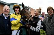 20 April 2025; Jockey Danny Mullins celebrates with groom Hannah Utley and owners Fearghal and Bronagh Eastwood after winning The WillowWarm Gold Cup (Grade 1) on Spindleberry during day two of the Fairyhouse Easter Festival at Fairyhouse Racecourse in Ratoath, Meath. Photo by Shauna Clinton/Sportsfile