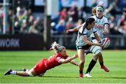 20 April 2025; Amee-Leigh of Ireland is tackled by Alex Callender of Wales during the Women's Six Nations Rugby Championship match between Wales and Ireland at Rodney Parade in Newport, Wales. Photo by Kian Abdullah/Sportsfile