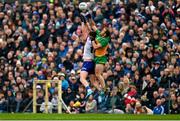 20 April 2025; Andrew Woods of Monaghan in action against Stephen McMenamin of Donegal during the Ulster GAA Football Senior Championship quarter-final match between Monaghan and Donegal at St Tiernach's Park in Clones, Monaghan. Photo by Ramsey Cardy/Sportsfile