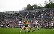 20 April 2025; Gary Mohan of Monaghan in action against Shane O'Donnell of Donegal during the Ulster GAA Football Senior Championship quarter-final match between Monaghan and Donegal at St Tiernach's Park in Clones, Monaghan. Photo by Ramsey Cardy/Sportsfile