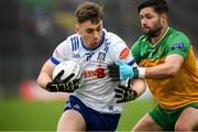 20 April 2025; Micheal Bannigan of Monaghan in action against Brendan McCole of Donegal during the Ulster GAA Football Senior Championship quarter-final match between Monaghan and Donegal at St Tiernach's Park in Clones, Monaghan. Photo by Philip Fitzpatrick/Sportsfile