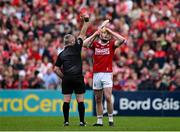 20 April 2025; Shane Barrett of Cork is shown a red card by referee Liam Gordon during the Munster GAA Hurling Senior Championship Round 1 match between Clare and Cork at Zimmer Biomet Páirc Chíosóg in Ennis, Clare. Photo by Brendan Moran/Sportsfile