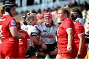 20 April 2025; Dorothy Wall of Ireland, centre, celebrates scoring a try with team-mates during the Women's Six Nations Rugby Championship match between Wales and Ireland at Rodney Parade in Newport, Wales. Photo by Kian Abdullah/Sportsfile