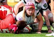 20 April 2025; Dorothy Wall of Ireland dives over to score a try during the Women's Six Nations Rugby Championship match between Wales and Ireland at Rodney Parade in Newport, Wales. Photo by Kian Abdullah/Sportsfile