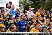 20 April 2025; Clare supporters watch the closing moments of the Munster GAA Hurling Senior Championship Round 1 match between Clare and Cork at Zimmer Biomet Páirc Chíosóg in Ennis, Clare. Photo by Brendan Moran/Sportsfile